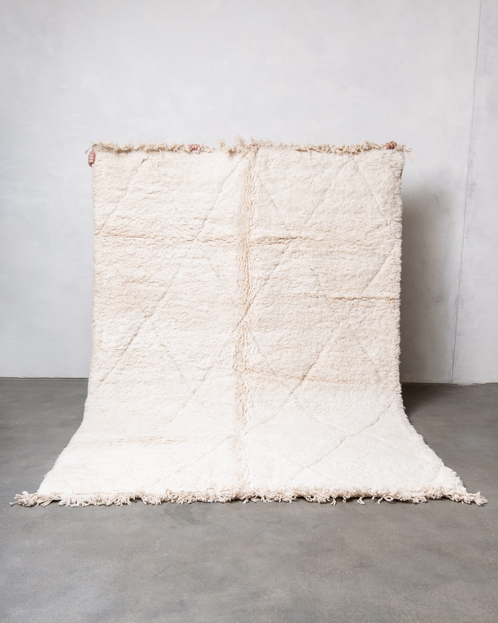 Modern, designer, handcrafted Berber rug from Morocco. Beniourain carpet with beautiful colours and patterns and fluffy wool texture.